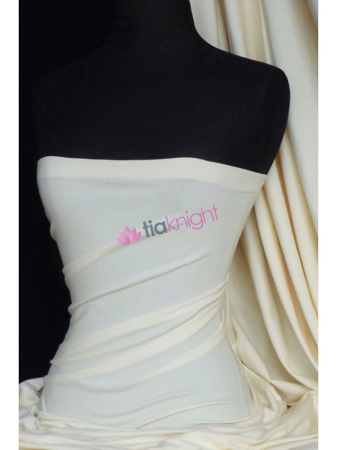 Clearance Cotton Lycra Jersey 4 Way Stretch Mid-Heavy Weight Fabric- Cream