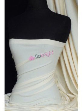 Clearance Cotton Lycra Jersey 4 Way Stretch Mid-Heavy Weight Fabric- Cream